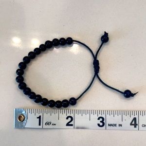 Adjustable bracelet with black beads